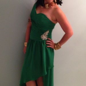 Asymmetrical emerald green dress